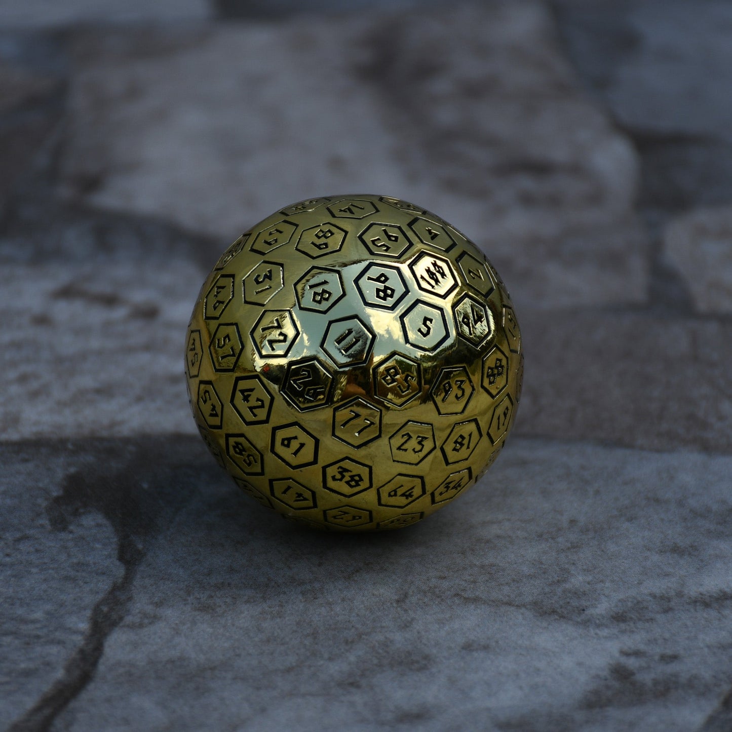 The Orb D100 - Black and Gold Metal Die